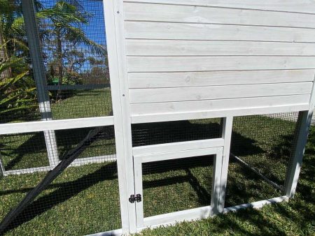 Majestic Chicken Coop white water based stain and black trim